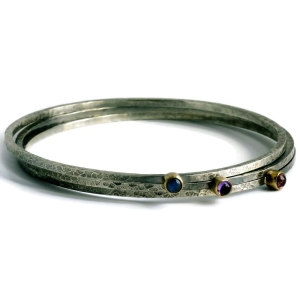Three blossom gemstone silver and gold stacking bangles (save £80) Three blossom gemstone silver and gold stacking bangles (save £80)