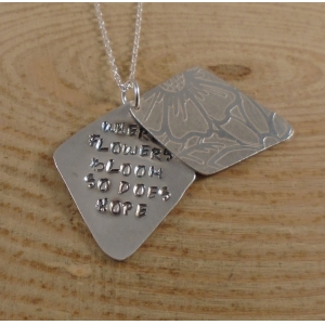 Sterling Silver Stamped 'Flowers Bloom' Hidden Message Necklace Sterling Silver Stamped 'Flowers Bloom' Hidden Message Necklace