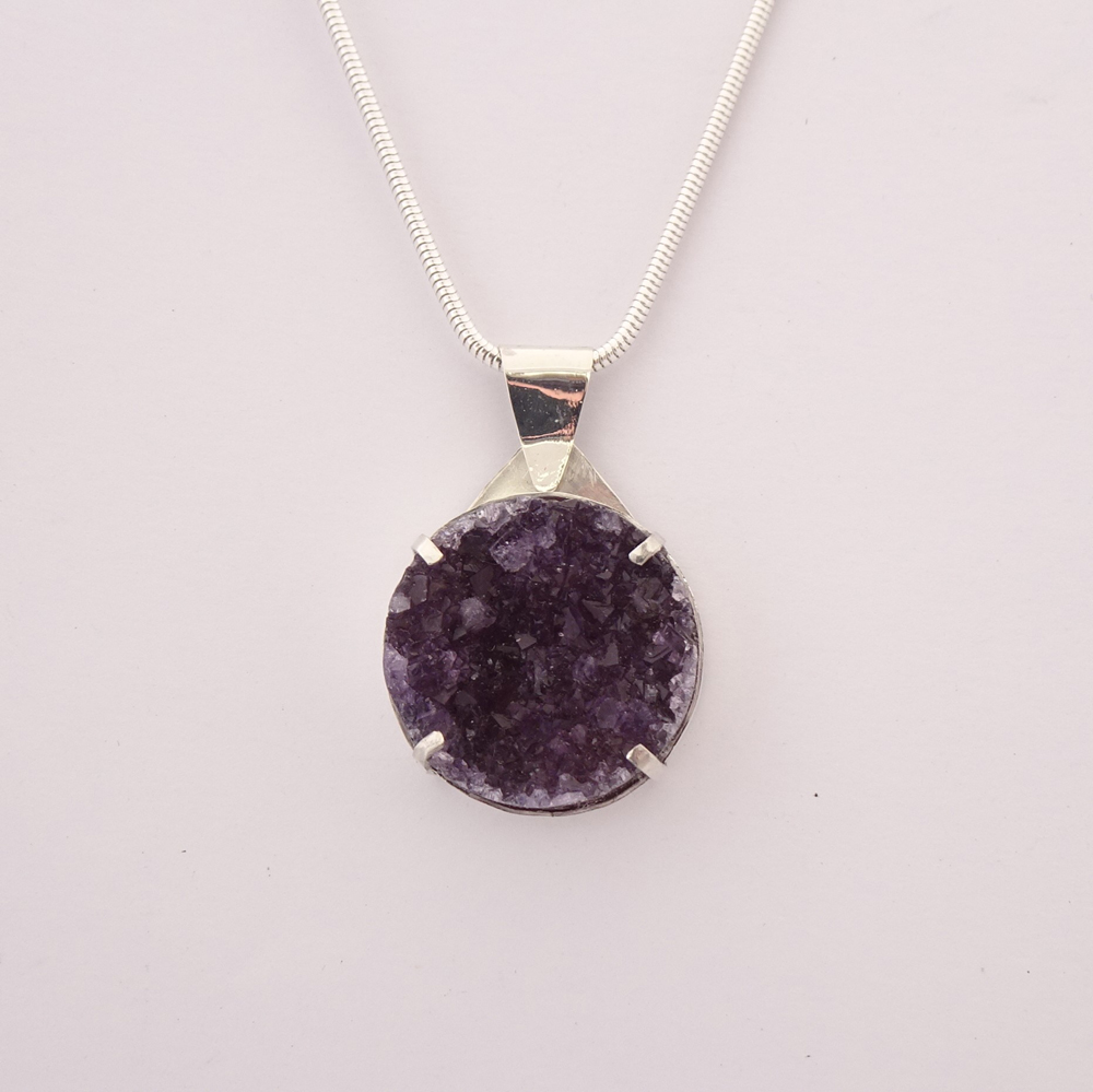 Amethyst crystal & silver pendant