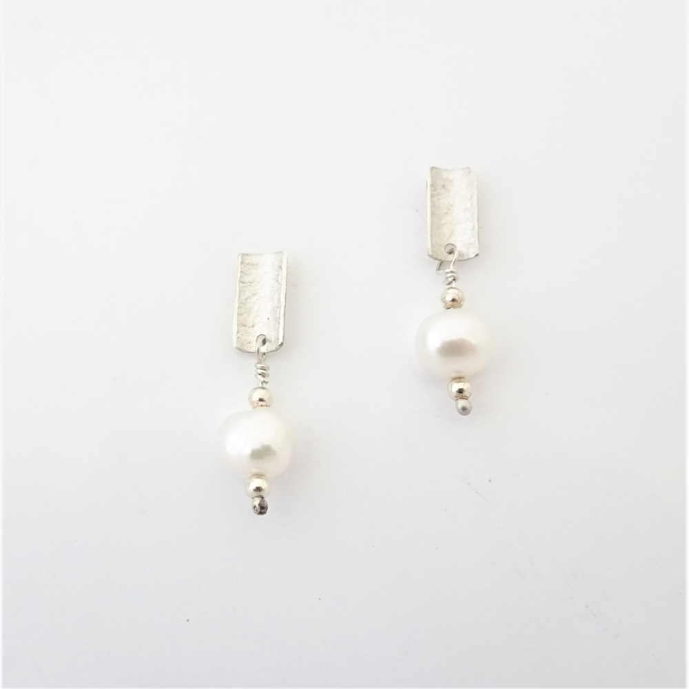 Silver studs with Pearl drops.